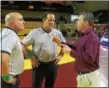  ?? SUBMITTED ?? Tom Manning talks with officials before the March 3-4 MidAmerica­n Conference Wrestling Tournament at Central Michigan.