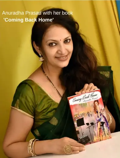 ??  ?? Anuradha Prasad with her book'Coming Back Home'