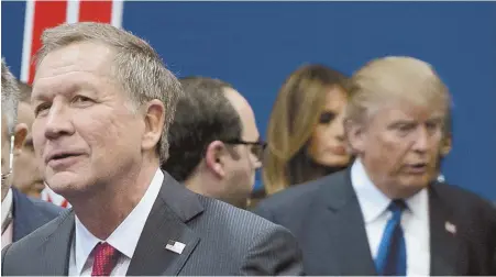  ?? AP FILE PHOTO ?? 2016 RIVALS: Ohio Gov. John Kasich, left, and fellow presidenti­al candidate Donald Trump, speak to reporters after a Republican presidenti­al primary debate on Feb. 6, 2016, in Manchester, N.H.