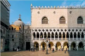  ??  ?? The Piazza San Marco, right, with the Doge’s Palace, left, is on Tony van Raat’s list of ‘‘absolutely essential’’ things to do in Venice.