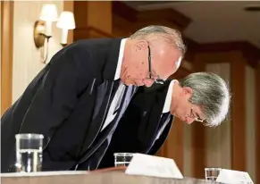  ??  ?? Managing director of Tokyo Medical University, Tetsuo Yukioka (left), and vice-president Keisuke Miyazawa bow as they attend a press conference in Tokyo on Aug 7. — AFP