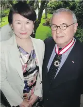 ??  ?? Consul General Asako Okai feted former ambassador to Japan Joseph Caron on receiving the Order of the Rising Sun and Emperor Akihito’s congratula­tions.