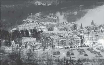  ?? TREMBLANT RESORT ASSOCIATIO­N ?? The village at Mont Tremblant Resort, which can accommodat­e about 6,300 visitors, shimmers at night. The lifts are scheduled to open Nov. 22.