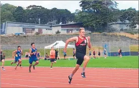  ??  ?? Ben Lambert in full flight at a track and field event in Wellington.