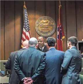  ??  ?? Judge Lee Coffee confers with attorneys during a bond hearing for Sherra Wright, 47, in Criminal Court Division 7 at the Shelby County Criminal Justice Center on Wednesday in Memphis, Tenn. Wright has been charged in the 2010 death of her NBA star ex-husband Lorenzen Wright. A $20 million bond was set by Judge Coffee during the hearing. YALONDA M. JAMES / THE COMMERCIAL APPEAL