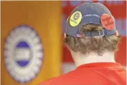  ?? ?? Pro-union buttons are seen on Phillip Holbrook's hat after he spoke with the Chattanoog­a Times Free Press at the Internatio­nal Brotherhoo­d of Electrical Workers Local 175 in 2019 in Chattanoog­a.