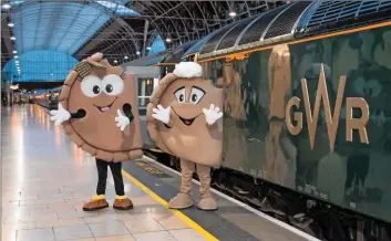  ?? GWR. ?? You see all sorts on the train these days. Mr and Mrs Pasty travelled on Great Western Railway’s ‘Night Riviera’ Sleeper recently, as GWR took the opportunit­y of Cornish Pasty Week (February 26-March 3) to promote the best way to travel from Cornwall....