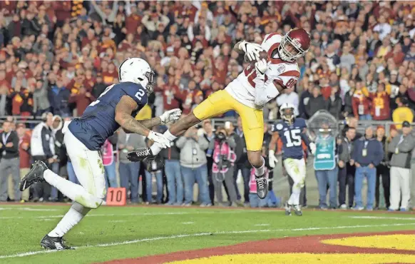  ?? KIRBY LEE/USA TODAY SPORTS ?? The Rose Bowl traditiona­lly matches a Pac-12 school versus a Big Ten school, and in 2017 it was Southern Cal playing Penn State.