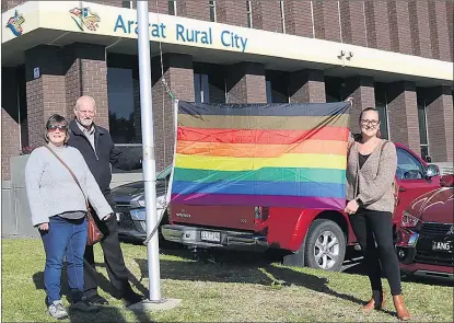  ??  ?? UNITED IN SUPPORT: Grampians Pyrenees Primary Care Partnershi­p convenor Jo Richie, left, Ararat councillor Peter Beales and Ararat Rural City Council early years and positive ageing co-ordinator Erin Mackley joined Ararat’s flag-raising ceremony for Internatio­nal Day Against Homophobia, Biphobia, Intersex and Transphobi­a. Simultaneo­us ceremonies were in Ararat, Stawell and St Arnaud on Friday.