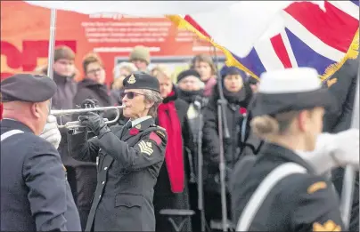  ?? BRIAN MCINNIS/THE GUARDIAN ?? Sergeant Cathy MacDonald of the P.E.I. Regiment plays “The Last Post” during Remembranc­e Day ceremonies at the cenotaph in Charlottet­own Saturday. Despite cold winds several thousand people gathered at the memorial to honour the fallen soldiers.