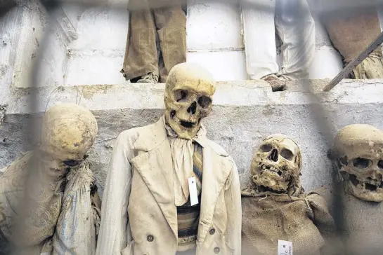  ?? DOMINIC ARIZONA BONUCCELLI ?? The Capuchin Crypt in Palermo, Sicily, displays mummified bodies (complete with clothing) intended to remind the living that life is temporary.