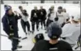  ?? DAVID DUPREY — THE ASSOCIATED PRESS FILE ?? Former Buffalo Sabres player Andrew Peters, left, and Sabres players talk during a workout in Amherst, N.Y.