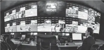  ?? ADAM HUNGER FOR USA TODAY SPORTS ?? The Replay Operations Center has 37 high- definition TVs connecting to all 30 MLB ballparks.