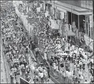  ?? AP/VINCENT YU ?? Thousands of democracy supporters march through Hong Kong on Saturday, a public holiday that marks the city’s hand-over but has become a big day for pro-democracy demonstrat­ions.