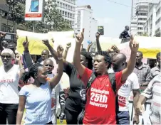  ?? KHALIL SENOSI/THE ASSOCIATED PRESS ?? Kenya civil rights groups protest the government closure of four TV stations on the streets of Nairobi, Kenya, on Monday.