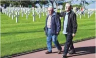  ??  ?? Gantois (on left) and his half-brother Henderson visiting the military cemetary in Los Angeles.