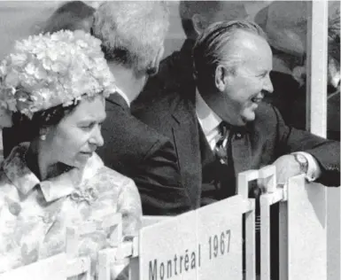  ?? THE CANADIAN PRESS ?? Queen Elizabeth II looks down from the mini-rail at Expo 67 during her tour of the site with Prime Minister Lester B. Pearson in July 1967. Fifty years later, there is a "pessimisti­c sense among ordinary Canadians that progress is ending, inequality is...