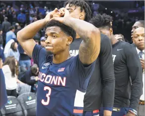  ?? Chris Szagola / Associated Press ?? UConn’s Alterique Gilbert reacts following Saturday’s 61-55 loss to Villanova in Philadelph­ia.