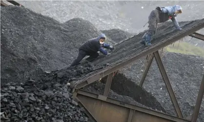  ?? Photograph: Huang Shi Peng/AP ?? Workers at a coalmine in Huaibei in Anhui province, central China.