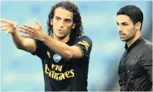  ??  ?? MIDFIELDER Matteo Guendouzi and coach Mikel Arteta. | Reuters