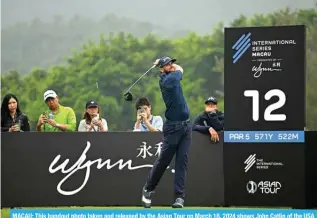  ?? – AFP ?? MACAU: This handout photo taken and released by the Asian Tour on March 16, 2024 shows John Catlin of the USA playing a shot during round three at the Internatio­nal Series Macau at the Macau Golf and Country Club.