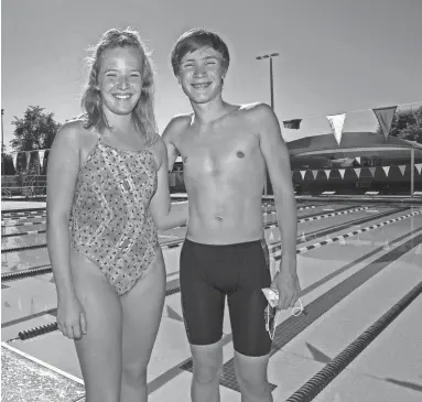  ?? PHOTOS BY ROB SCHUMACHER/THE REPUBLIC ?? Peoria Sunrise Mountain High swimmers Whitney and Casper Jensen pose at Sunrise Mountain Pool.