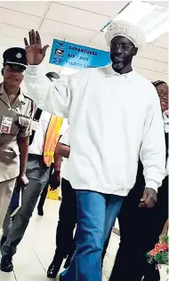  ??  ?? Reggae and dancehall artiste Buju Banton arrives at the Norman Manley Internatio­nal Airport in Kingston last night.