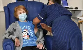  ??  ?? Margaret Keenan becoming the first patient in the UK to receive the Pfizer-BioNTech vaccine outside a trial. Photograph: Jacob King/AP