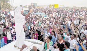  ?? — AFP photo ?? Salah chants against Bashir during a demonstrat­ion in front of the military headquarte­rs in the capital Khartoum.