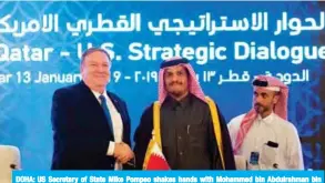  ??  ?? DOHA: US Secretary of State Mike Pompeo shakes hands with Mohammed bin Abdulrahma­n bin Jassim Al-Thani, the Deputy Prime Minister and Qatari Minister of Foreign Affairs, at the Sheraton Grand in the Qatari capital yesterday. — AFP