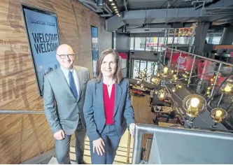  ?? PETER J. THOMPSON/NATIONAL POST ?? Boston Pizza’s Alan Howie,executive vice-president of operations and developmen­t, and Helen Longford, senior vice-president of food services and design at the company’s soon-to-be-opened location at Front and John streets in Toronto onTuesday.