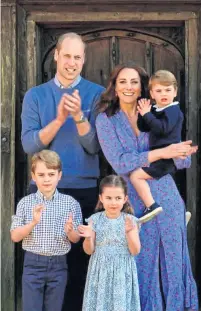  ??  ?? The Duke and Duchess of Cambridge and their children take part in Clap for Carers.