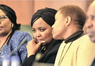  ?? PICTURE: PHANDO JIKELO ?? NOT CONVINCED: Sassa’s officials Pearl Bhengu, Zodwa Mvulane and Tsakeriwa Chauke at the Scopa meeting.