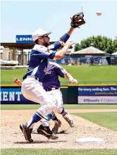  ?? Staff file photo by Hunt Mercier ?? ■ Linden-Kildare Tigers third baseman Jacob Owen catches the ball for an out before a Dallardsvi­lle Big Sandy Wildcats runner can reach the base during the Class 2A state championsh­ip on June 6, 2019, at Dell Diamond in Round Rock, Texas. The Tigers lost, 1-7.