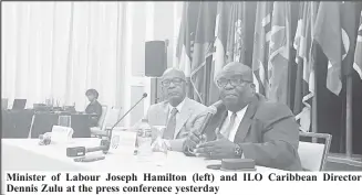  ?? ?? Minister of Labour Joseph Hamilton (left) and ILO Caribbean Director Dennis Zulu at the press conference yesterday