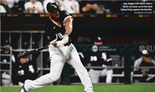  ?? JAMIE SABAU/GETTY IMAGES ?? Sox slugger Jose Abreu clubs a three-run home run in the third inning Friday against the Red Sox.