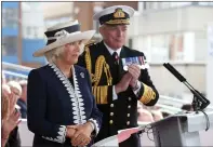  ??  ?? Camilla names the ship, watched by Admiral Sir Philip Jones.