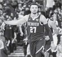  ?? DAVID ZALUBOWSKI THE ASSOCIATED PRESS ?? Denver Nuggets guard Jamal Murray, a Kitchener native, had a career-most 48 points on Monday. The 21-year-old has led Denver to a 9-1 record, third-best in the NBA entering Tuesday’s games.