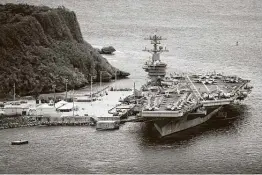  ?? Conner D. Blake / U.S. Navy / /AFP via Getty Images ?? The aircraft carrier USS Theodore Roosevelt is among a group that sailed into the South China Sea on Saturday, the same day Taiwan reported that multiple Chinese jets and bombers had flown into its air defense zone.