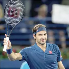  ?? — Reuters ?? Switzerlan­d’s Roger Federer celebrates after winning his Quarter Final match against Spain’s Fernando Verdasco.