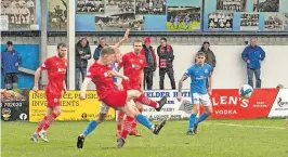  ?? ?? Danger Flynn Duffy scoops a deep cross into the Stranraer box