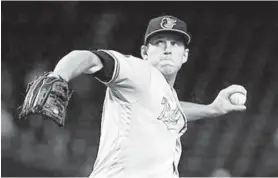  ?? NORM HALL/GETTY ?? Orioles starter John Means bears down against the Diamondbac­ks on Wednesday.