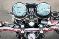  ??  ?? Comprehens­ive instrument­ation mimics that of the iconic CB750/Four. Green-faced Nippon Denso dials are very 1970s