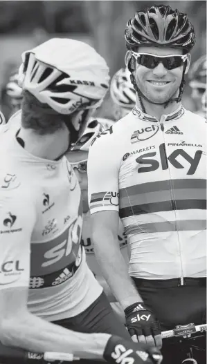  ?? DOUG PENSINGER / GETTY IMGES ?? Bradley Wiggins, left, and Mark Cavendish have helped lead Britain to five stage victories
from four different cyclists this year — the same number as the riders from France.