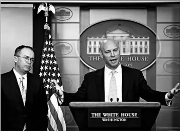  ?? ALEX BRANDON/ASSOCIATED PRESS ?? White House negotiator­s Mick Mulvaney, left, and Marc Short defend the shutdown positions of President Donald Trump and Republican leaders Saturday at the White House.