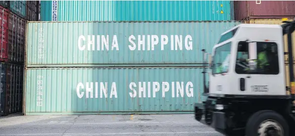  ?? STEPHEN B. MORTON / THE ASSOCIATED PRESS FILES ?? Perhaps the most disturbing provisions in the USMCA agreements are two inserted near the end, writes the Post’s Andrew Coyne. The first would potentiall­y restrict Canada’s ability to strike free-trade agreements with China and other “non-market” countries. The second demands each country refrain from “competitiv­e devaluatio­n” of its currency.