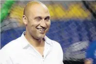  ?? WILFREDO LEE/AP ?? Miami Marlins CEO Derek Jeter watches batting practice before the start of Wednesday’s game against the Los Angeles Dodgers. The Marlins are on pace to lose 103 games this season.