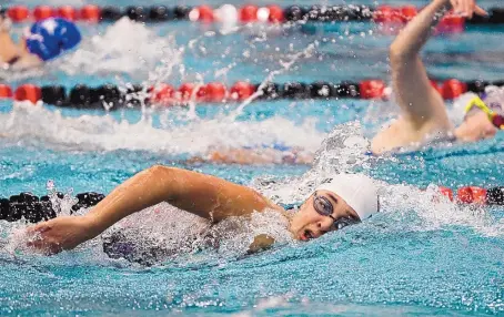  ?? ROBERTO E. ROSALES/JOURNAL it Saturday ?? Eldorado’s Francesca Benavidez starts to pull away from the field in the girls 200-yard freestyle. She would eventually go on to win morning at Albuquerqu­e Academy.