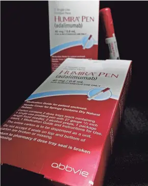  ?? DAVID J. PHILLIP/ASSOCIATED PRESS ?? California has filed a lawsuit accusing pharmaceut­ical giant AbbVie of illegally plying doctors with cash, gifts and services to prescribe Humira, one of the world's biggest selling drugs.