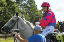  ?? Photo: GLEN McCULLOUGH ?? MAGIC VICTORY: Toowoomba apprentice Sally Sweeney returns after her Burgess Park win on Magic Ink.